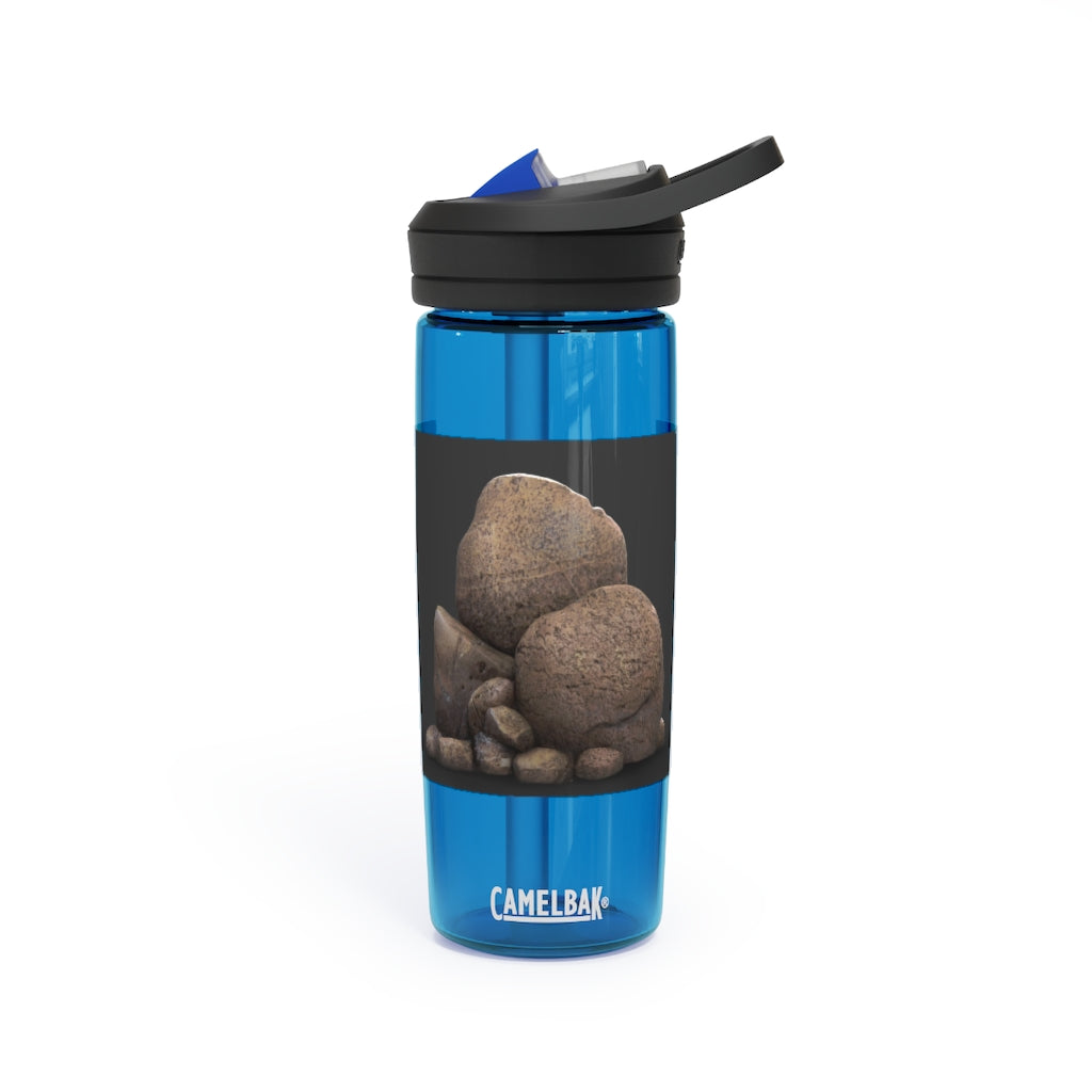 Rocks CamelBak Eddy® Water Bottle in 20oz and 25oz sizes, showcasing its durable Tritan™ material and spill-proof design.